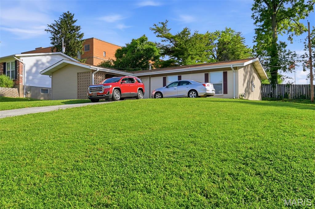 Investment Opportunity! Package listing-MLS numbers: 26034659, 26034650, 26033652, 26033650, 26033647, 26033641, 26033262, 26033257 & 26032699. Ideally located in Fernwood subdivision off Olive Blvd. Three bedroom, two full bath home, with vaulted ceilings and main level living. Open floor plan and updated kitchen and baths, plus storage area off the carport.