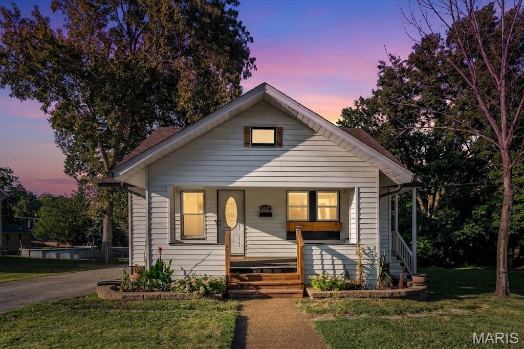 Charming & Cozy Bungalow with Endless Flexibility!
Welcome home! This delightful 3-bedroom, 1-bath bungalow packs a punch with stylish updates, fantastic functional space, and a yard made for relaxing.

Step inside to find gorgeous, newer LVP warm hardwoods that flow seamlessly throughout the main level. The heart of the home is an incredible, fully renovated kitchen featuring custom cabinetry, a stylish tile backsplash, and a gas stove that's ready for your favorite recipes. Two cozy bedrooms, a refreshed modern bathroom, and the absolute convenience of main-floor laundry complete the main level. Little details throughout such as tall baseboards, trimmed windows, and wainscoting make this home feel instantly elevated. 

Head downstairs to discover a spacious lower-level flex space (home office, workout area, or extra storage) with the flooring already finished and waiting for your personal touch. Plus the 3rd bedroom is the smallest of the 3 but gets the job done with a closet and window! Maintained systems and PVC sewer lateral line give you piece of mind. 

Outside, the perks continue! Enjoy lazy weekends or evening BBQs on the expansive back deck overlooking a wonderfully spacious, private lot with partial fencing. Plus, you’ll have a handy storage shed for your gear and an extra-large driveway providing plenty of parking for you and your guests.

Comfortable, stylish, and packed with value—come take a look and see how easy it is to fall in love!