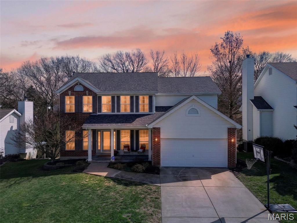 Welcome home to this stunning two-story residence boasting 5 bedrooms, 3.5 baths, and over 3,600 square feet of total living space. Situated on a premium lot back to woods, this home offers privacy and serene views from your backyard oasis. Step inside to a spacious foyer with beautiful hardwood floors that flow throughout the main level. The large dining room is perfect for family gatherings, while the great room features a wood-burning fireplace flanked by built-in shelving and a bright bay window overlooking the tree-lined backyard. The updated kitchen is designed for both style and functionality. Upstairs, you’ll find 4 spacious bedrooms including an expansive primary suite with a luxurious updated bath featuring a soaking tub—the perfect place to unwind. Each secondary bedroom offers generous closet space. The finished walkout basement includes a large recreation room with a wet bar, a full bedroom and bath—ideal for guests or a private retreat—plus plenty of storage and a dedicated workspace for hobbies. Step outside to the oversized patio beneath the deck and enjoy the peaceful, wooded setting. Freshly painted and move-in ready, this home blends comfort, space, and tranquility—perfect for making new family memories!