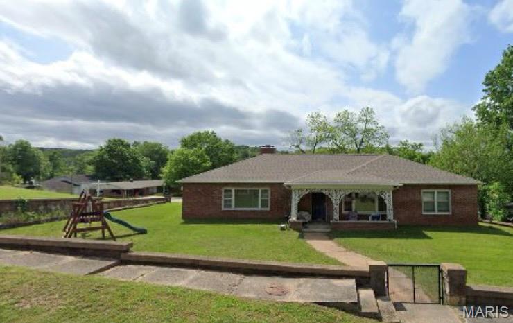 Beautiful 3 bedroom/2 bath brick home in the city limits features beautiful hardwood floors, large cedar-lined closets, laundry room, spacious living room, dining room, fireplace, central heat and air, two car garage. Full unfinished basement great for storage, appliances included and above ground pool included with purchase. Near Current River, Clearwater Lake, and all the other attractions the area has to offer!
