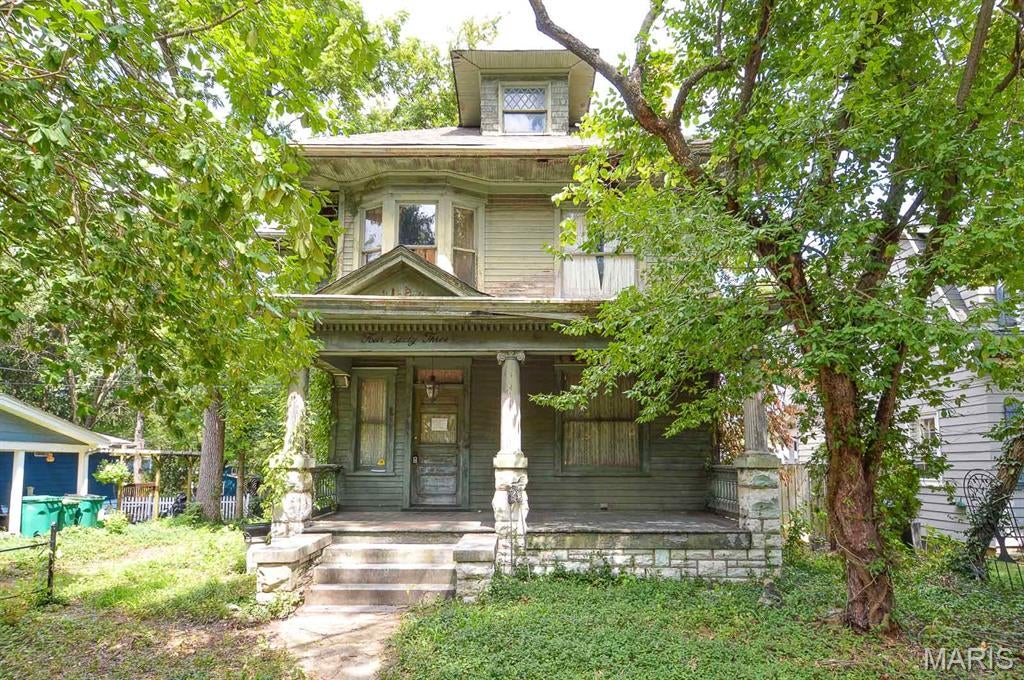 Price listed is Starting Bid Only. Bidding starts closing 10/1/2026 @ 5 p.m.  Opportunity awaits for any real estate investor or savvy flipper with this potential-filled 3BR/1BA home located within the highly desirable community of Webster Groves! Formerly a stately residence, this property offers an exciting opportunity to remodel and update while restoring its one-time grandeur and original character. The main level features a spacious living room anchored by a wood-burning fireplace and opening to a formal dining room with convenient access to the kitchen. A decorative staircase leads to the second level, which houses all three bedrooms, including an oversized primary bedroom, along with a shared full bathroom. A second staircase continues to the unfinished third-level attic, offering potential for additional finished living space, a home office, recreation area, or other flexible use. The full, unfinished basement provides washer and dryer hookups and houses the home's utilities, including a natural gas-powered boiler providing radiant heat and a natural gas-powered hot water heater. The home is cooled by window air-conditioning units, which will need to be purchased and installed by the new owner. Water is connected to the home but is currently turned off. Outside, a covered front porch is shaded by mature trees, while a gravel driveway leads to a detached 2-car garage. With its desirable Webster Groves location, classic character, and tremendous potential, this property is ready for a new owner to bring their vision to life! Buyer to independently verify the condition of all components of the home to include the HVAC. Property will sell under auction terms and be sold AS- IS, WHERE-IS. Seller, will not make any repairs as a result of any building, occupancy, or environmental inspections. Buyer will be required to sign an Auction Purchase & Sale Agreement if final bid is accepted by Sellers.