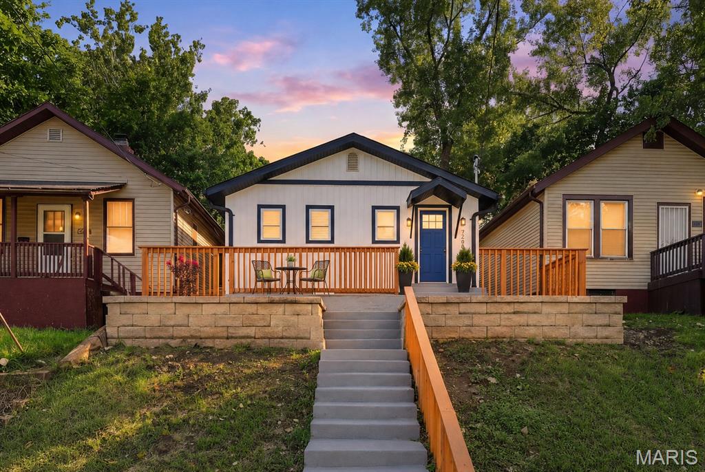 Beautifully renovated from top to bottom, this 3-bedroom, 2-bath home pairs thoughtful design with comfortable one-level living. Step inside to a bright, welcoming living room featuring stylish wood-slat accent walls, contemporary lighting, and new flooring that flows throughout the home. The updated kitchen offers modern finishes and a fresh, functional space for everyday living. Retreat to the spacious primary suite with a private bath and walk-in closet, while two additional bedrooms and a second beautifully finished full bath provide plenty of flexibility. Both bathrooms showcase eye-catching tilework and upgraded fixtures. Exterior improvements include replaced siding and roof, a fresh concrete front entry and rear patio, privacy fencing, and two-car gravel parking off the alley. Conveniently located just blocks from the 24:1 Cinema and Janet Majerus Park, this completely refreshed home is ready for its next owner!