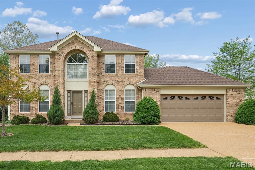 One-owner Cumberland Model with the Belle Coeur model second floor, by Rowles, lovingly called the “Sunshine House.” This inviting two-story home features an open foyer and bay windows that fill the living room, family room, and primary bedroom with natural light. The thoughtfully designed layout offers three spacious bedrooms, two full baths and a powder room. Two warm and cozy wood-burning fireplaces highlight the family room and primary bedroom, with custom built-ins surrounding the family room fireplace. The kitchen and butler’s pantry feature classic white cabinetry, granite countertops, and energy-efficient appliances. Hardwood flooring highlights the foyer, powder room, and kitchen, while plush Mohawk carpeting adds comfort to the living room, dining room, family room, and all bedrooms. New roof in 2025. Main-floor laundry & a Beam central vacuum adds convenience, excellent outdoor living with a spacious patio, a fully fenced yard, and an oversized two-car garage. A must-see home—schedule your showing today.
