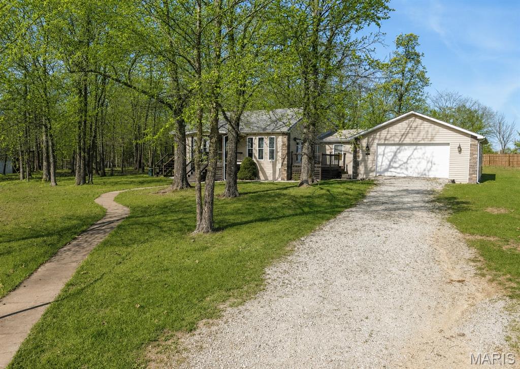 4BD/2BA Custom Built with lots of storage. Open Floor Plan. Large Bedrooms, With large closets. The Living Room has a free standing wood-burning FP. Large windows for lots of light. The kitchen has a tile backsplash and a beverage cooler built in. Newer dishwasher and refrigerator. Double Oven. Breakfast bar with over-the-counter lighting. Rock Front. Walk-in Pantry with Laundry room, walks out to a  2 car oversized garage. Includes a 30 x 30 shop with a concrete floor, 200 AMP electric service, set-up frame machine, storage shed and chicken coop. All is fenced for your livestock and a private winding drive. Less than 1/2 off of Z hwy. CLose to Mark twain National Forest