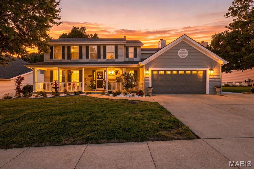 Thoughtful By Design!
Bright, polished, welcoming and wonderfully complete—this is the kind of home buyers wait for. Nearly every corner of this almost 2,700-square-foot Summer Chase home has been thoughtfully reimagined, pairing transitional-modern style with timeless warmth, exceptional functionality and custom touches that make everyday living feel just a little more special. The experience begins outside with professional landscaping and a full-length front porch that gives the home an unmistakably inviting presence. Inside, calm neutral colors, extra-wide baseboards and beautiful high-end laminate flooring create a fresh, cohesive backdrop throughout the main level. A charming front room features a decorative paneled accent wall and flows toward the kitchen through a beautifully designed coffee bar with quartz counter and tiled backsplash. It is the perfect introduction to a kitchen where seemingly no detail was overlooked. Quartz surfaces, custom tile, updated cabinetry and modern lighting surround an oversized island with breakfast seating. High-end stainless appliances include an impressive oversized refrigerator and dedicated ice maker, while a deep farmhouse sink and statement-making custom cabinetry range hood bring style to the hardworking heart of the home. Open the cabinets and the thoughtful details continue—pullout drawers, deep storage for pots and pans, a Lazy Susan and a mixer pullout make organization wonderfully effortless. With additional dining space just steps away, the kitchen opens naturally to the family room, where a fireplace flanked by custom built-ins creates a cozy gathering place. Open the doors to the covered outdoor living area with two ceiling fans and a grilling space, then enjoy the landscaped, fully fenced backyard and fire pit beyond. From morning coffee to weekend cookouts and crisp fall evenings around the fire, this home makes it easy to enjoy every season. A main-floor laundry and mudroom with deep utility sink connects conveniently to the 2-car garage, and a half bath adds everyday practicality. An expanded driveway provides an additional third parking bay. Upstairs feels equally fresh and inviting. Updated carpeting and an extra-wide hallway lead to four bedrooms, including a vaulted primary retreat with custom walk-in closet and beautifully remodeled ensuite. Custom tile, tiled flooring, a relaxing tub, separate shower, updated vanity and lighting create a peaceful place to begin and end the day. Three additional spacious bedrooms and another updated full bath complete the upper level. The finished lower level is not an afterthought—it is another beautifully planned extension of the home. Luxury vinyl flooring carries through generous recreation and multipurpose areas, complemented by built-in shelving, a refrigerator and bar area, half bath and an additional playroom/flex space with barn door. A separate unfinished area with shelving provides valuable storage. Set within established Summer Chase in the Rockwood School District, the home enjoys a neighborhood known for mature landscaping, community pool and tennis courts, and convenient access to parks, recreation, shopping, dining, Route 141 and I-44. What makes this home truly stand apart isn't one single renovation—it is the remarkable collection of them. Beautiful spaces, clever storage, custom finishes, comfortable gathering areas and indoor-outdoor living have all been considered together. Finding this much quality, function and personality in one move-in-ready home is rare. Come experience the difference.