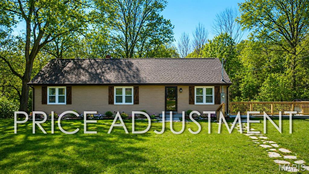 OPEN SAT 1-3PM! COMPLETELY REBUILT! Rare opportunity - Beautifully rehabbed 3 bedroom ranch home with an exceptional location on over 2.8 acres including an attached two car garage, new roof, an outbuilding AND a huge brand new back deck with two sets of stairs. You will love the updated and thoughtful finishes throughout! New roof-windows-new electrical-new installation JUST to name a few . As you enter the inside, you'll be greeted by warm flooring, high ceilings and a great open flow. Stunning fireplace in the living room! Dining area has double doors to the back deck and also connects to the BEAUTIFUL, spacious kitchen with all brand new appliances featuring built-in microwave, hood and all Cafe appliances. Custom cabinetry and quartz countertops round up your kitchen area. Main floor primary bedroom has double doors, double closets and connects to the upstairs loft room - a great space which could be used as an office, playroom, dressing room or even as an additional sleeping room! Full bathroom has ample room for you and your family. Two sizable bedrooms and an additional half bath complete the main level. For more living space you could finish the lower level. This basement features a walkout and lots of storage space! Outside you'll find lots of gardening space, playground areas, lots of privacy and beautiful wooded views. Great backyard with endless options, add a pool/ hot tub or even an outdoor kitchen! Conveniently located between the 2,000 acre Creve Coeur Park & Lake and the very nice Maryland Heights Community Rec Center, AAA Parkway schools with McKelvey Elementary School, close to all shopping, restaurants and quick highway access! You do not want to miss it - this is a one of kind home. CALL NOW!