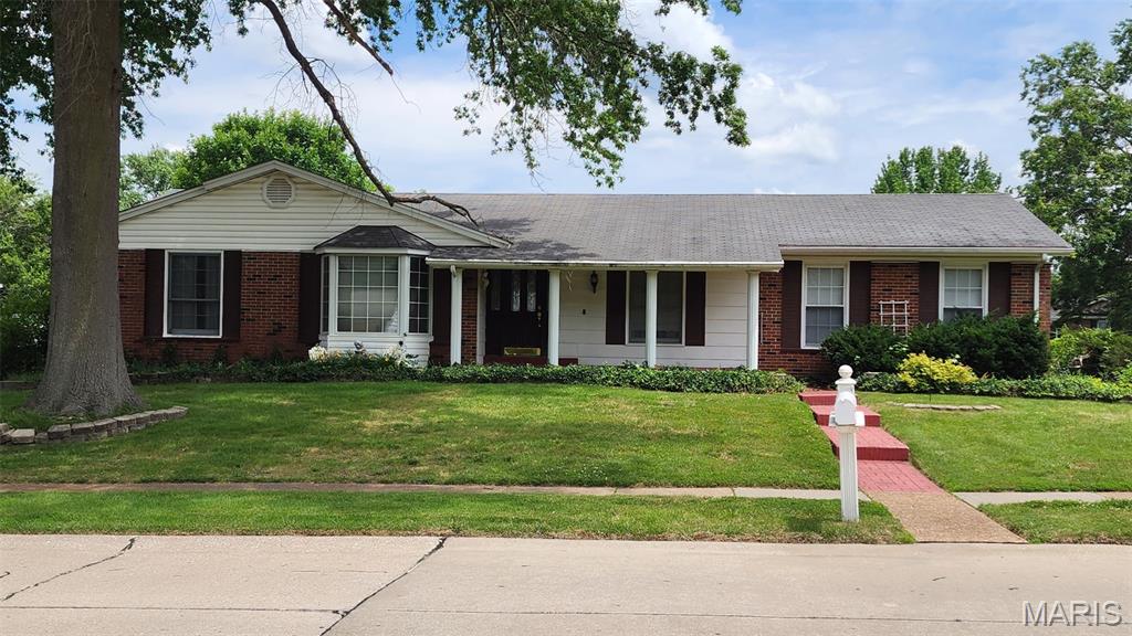 Welcome to 2900 Heatherton Drive in Florissant! This well-maintained, one-owner home offers a wonderful opportunity to make it your own. Situated on a desirable corner lot, this property features beautiful original wood floors, elegant crown molding, and timeless character throughout.  The spacious layout includes a partially finished basement, providing additional recreation, or storage space to fit your needs. A two-car garage offers convenience and ample room for vehicles and hobbies.  Proudly owned by the same family since it was built, this home has been lovingly cared for and is ready for its next chapter. Being sold AS-IS, it presents an excellent opportunity for buyers looking to add their personal touches while building equity. Some stainless steel appliances in kitchen.  Conveniently located near shopping, dining, parks, and major highways, schools, this is a property you won't want to miss!