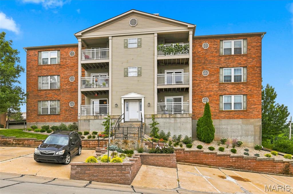 Don't miss this upper-level 2-bedroom, 2-bathroom condo with  updated flooring all over the unit. Step inside to an inviting open layout highlighted by vaulted ceilings and spacious living room accommodates large furniture arrangements,  with direct slider access to your private deck with a storage space with updated flooring. Eat-in kitchen and all appliances included in the sale. Enjoy the ultimate convenience of private, in-unit laundry hookups with washer and dryer included in sale. The primary bedroom suite boasts a huge walk-in closet, an updated light/fan fixture, and a private full bath with ample storage and vanity space. The generous secondary bedroom is equally impressive, offering dual closets, large windows, and a functional built-in space. A large hallway bath features a clean tub/shower combination. Boasting fresh paint and newer flooring throughout, this turnkey unit feels brand new. The monthly condo fee covers water, sewer, and trash utilities, and residents enjoy access to the community pool. Move right in and make this exceptional condo your next home!