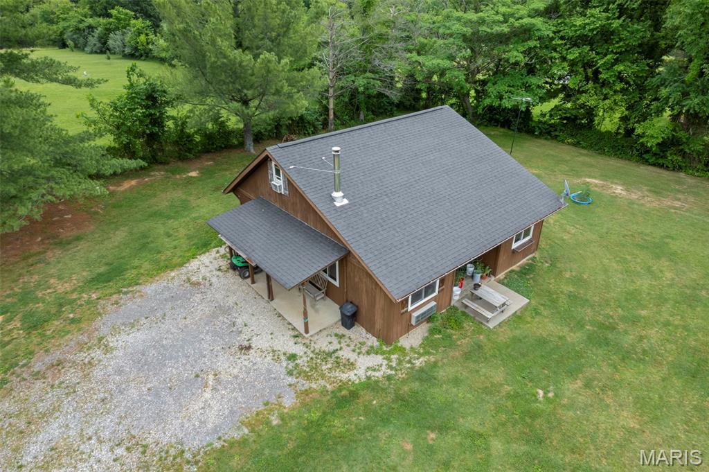 This 2.2 acre property offers 2 homes and a 4 stall horse barn. Separate entrances to each home. Storm shelter located on the property. Country living at its finest!