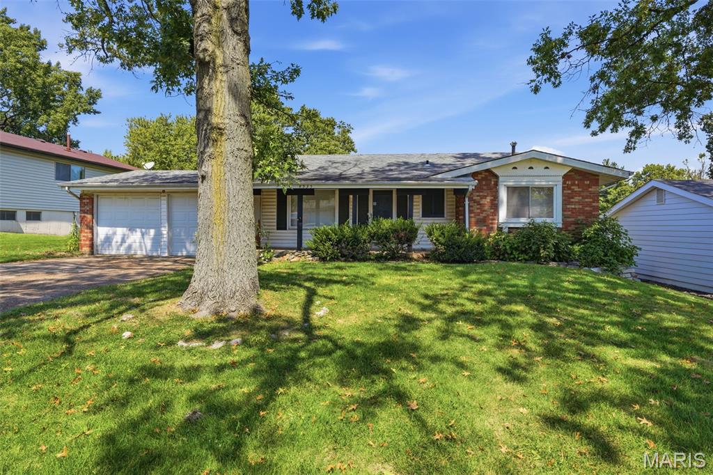 Welcome to this spacious 3-bedroom, 2-bath ranch-style home offering a comfortable and functional layout. The inviting living area provides a great space for relaxing or entertaining, while the bedrooms offer flexibility for family, guests, a home office, or additional living needs. The partially finished basement adds valuable bonus space that can be used as a recreation room, home gym, office, or hobby area, with walk-out access to the fenced backyard. An attached garage provides convenient parking and storage, while the established residential setting offers easy access to nearby schools, shopping, dining, parks, and major roadways.