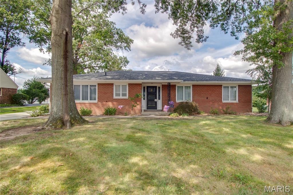 Back on the market, this is your chance! Hello storage! Welcome home to this charming brick ranch in the beautiful and highly desirable Greenwood Meadows neighborhood. This well-maintained 2-bedroom, 2-bath home combines comfortable one-level living with thoughtful updates throughout. The updated kitchen features a fresh, modern feel, while both bathrooms have been tastefully updated for today’s lifestyle. Enjoy hosting with a huge additional family room with built in shelving, living room and dining room and a large patio outside.

Storage is a standout feature, with plenty of space to keep everything organized and out of sight. A spacious 2-car garage provides additional space and convenience, making it easy to accommodate vehicles, tools, hobbies, and more. This inviting home offers the perfect blend of comfort, updates, storage, and location. A wonderful opportunity to enjoy easy ranch-style living in a neighborhood you'll be proud to call home.