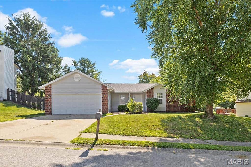 Welcome Home! This charming 3 bedroom/2 full bath home has a fireplace and a covered patio.  New stainless appliances, new privacy fence for fully fenced back yard in 2025, new roof and gutters 2025.  2 car garage on a cul de sac.  New carpet and new patio door.