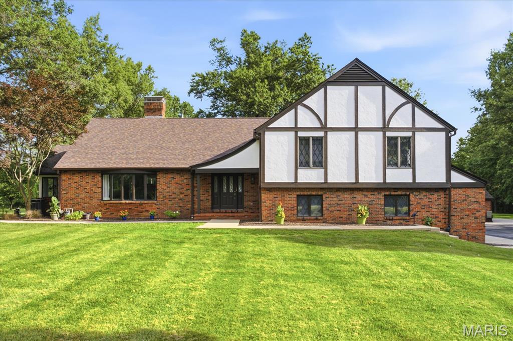 Welcome to 10 Brighton Place in Shiloh, IL — an exceptional 3+ acre estate offering privacy, beautiful landscaping, and over 3,500 sq ft of completely renovated living space. A private winding drive leads you to this stunning home featuring modern updates while maintaining timeless character.
Inside, you’ll find new plaster, fresh paint throughout, new engineered hardwood flooring, custom tile work, and stylish new lighting. The updated kitchen is a true showstopper with custom cabinetry, quartz countertops, stainless appliances, a commercial refrigerator, and a 36" gas range. The main level offers a private den with built-in bar and half bath, dedicated dining room, and spacious living room perfect for entertaining.
The partially finished basement adds even more living space with a large family room/recreation area, bonus room, and full bath. Upstairs features four spacious bedrooms, including one currently used as an office with built-in storage. The renovated bathrooms showcase custom tile finishes and new vanities. The expansive primary suite includes multiple closets, a private balcony overlooking the backyard, and a beautifully updated bath with walk-in shower.
Enjoy the outdoors from the new concrete patio and sidewalk overlooking the massive, level backyard. The bright sunroom is the perfect place for morning coffee, relaxing, or displaying your favorite plants. In addition the home features an attached 2 car garage as well as a matching brick detached garage w/workshop area. This rare Shiloh property offers the perfect blend of privacy, luxury updates, and incredible space. Buyers and buyers agents to verify all data.