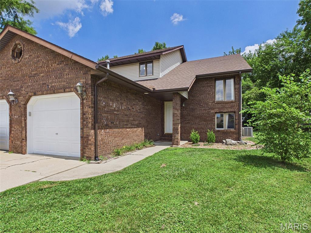 Welcome home to this 3-bedroom, 2.5-bath home tucked away in the heart of Edwardsville, backing to mature trees for added privacy and a peaceful setting. The bright, open-concept main level offers a spacious living room, a convenient half bath with laundry including the washer and dryer that stay, a dining area, and a well-appointed kitchen featuring a breakfast bar and all appliances included. Upstairs, you'll find a comfortable primary suite with a private full bath & large walk in closet, along with two generously sized bedrooms and an additional full bathroom. Step outside to the covered patio just off the kitchen—perfect for relaxing, grilling, or entertaining while enjoying the tree-lined backyard. The unfinished basement offers endless possibilities for future living space and includes a second washer/dryer hookup. Conveniently located near shopping, dining, parks, schools, and all that Edwardsville has to offer. Best of all, there's no HOA! Schedule your private showing today before this one is gone!