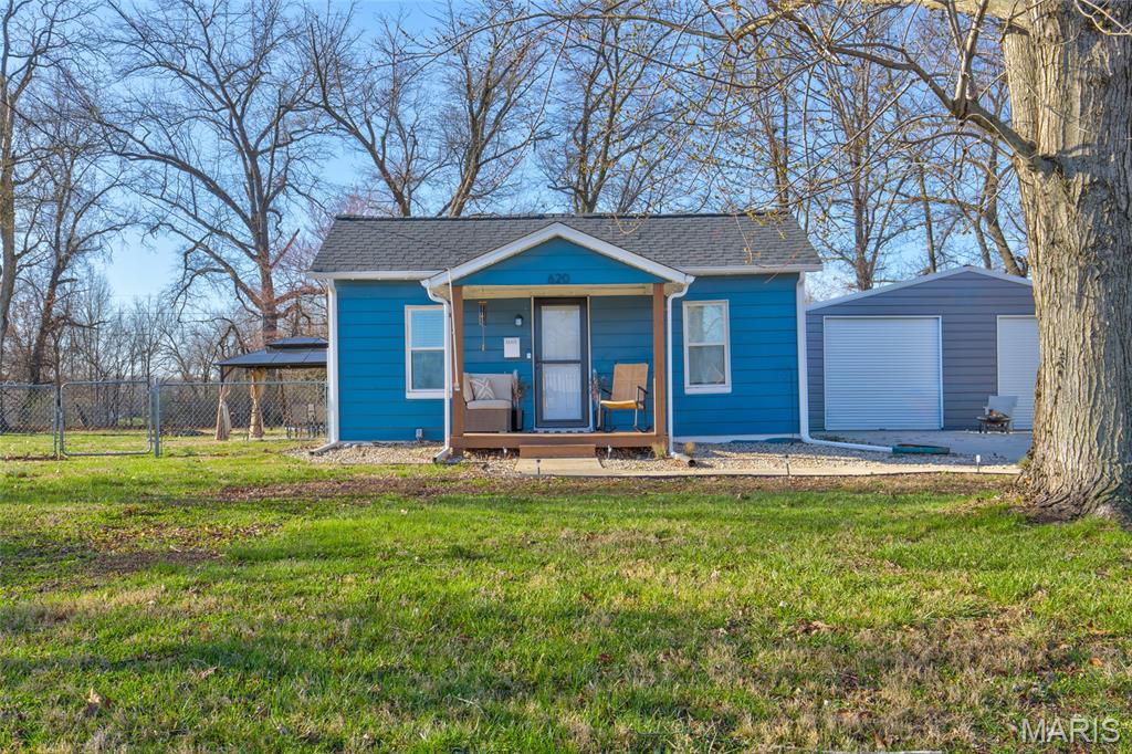This completely updated two-bedroom, one-bath home in the Bethalto School District is sure to impress from the moment you walk in. The living room and kitchen feature beautiful luxury vinyl flooring, and the fully updated kitchen is equipped with stainless steel appliances. The bathroom has been tastefully remodeled with new tile, vanity, and lighting. The bonus room provides the perfect additional space for a home office or playroom. Outside, you’ll find a large fenced-in backyard complete with a pool. The concrete driveway was added in 2022 and leads to a spacious two-car detached garage. This is one you won’t want to miss. Call your favorite agent today to schedule your private showing.