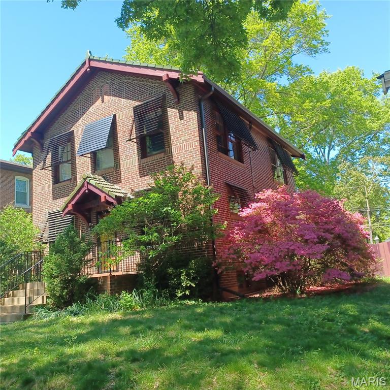 Classic U City family home, this appealing 3 bedroom is all ready for new owners. The spacious living room with handsome gas fireplace and separate dining room are perfect for entertaining. The new kitchen is so delightful with all white appliances, new cherry wood cabinets, new quartz counter tops and a marble mosaic back splash. The new Forno gas stove is vented to the outside. The stairs up can be accessed from the both the kitchen and the living room. Upstairs the main bedroom has a walk in closet, and all three bedrooms have custom closets. There is a medicine closet as well as a linen closet in the hall, the bathroom has been updated and is generously proportioned. The full basement has lots of storage space and a full bathroom. With fresh paint throughout and natural wood floors, you'll be placing your furniture before you leave! A large 2 car garage has extra storage space and a pull down ladder leading to the garage attic, floored and perfect for storage.  All windows in the garage are operational. Garage will be totally empty prior to closing. New AC (2026), new roof and gutters on home (2020), new roof and gutters on garage (2026). All appliances including washer and dryer stay. Great Location, this home is two blocks from the Danforth Campus and metro link, walk to the loop, shopping restaurants and more! This is a winner!