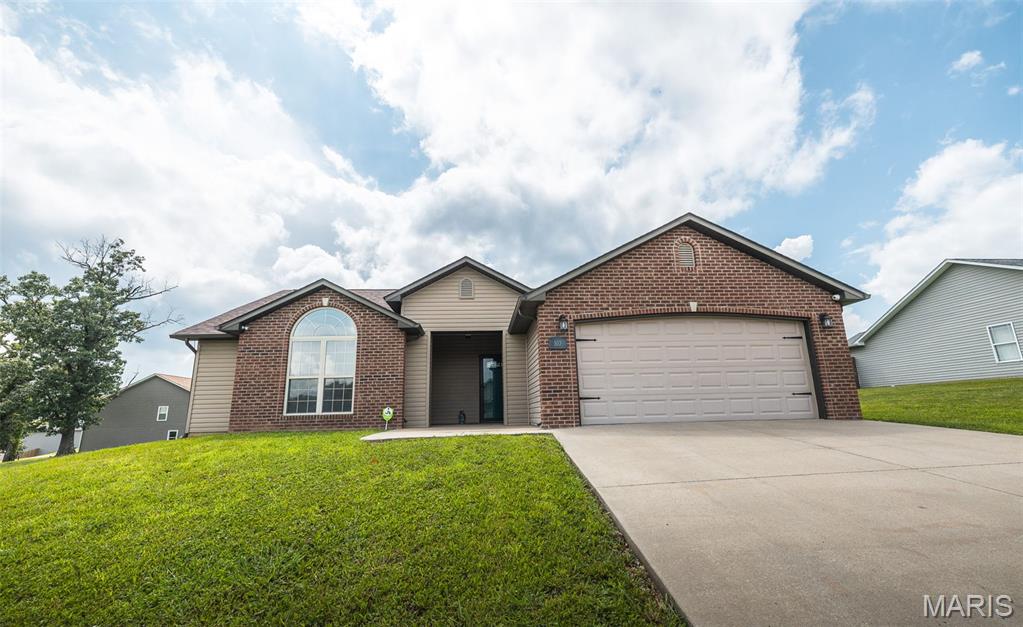 Located in the highly desirable Briar Pointe subdivision, this beautifully updated ranch-style home is packed with upgrades. Featuring 3 spacious bedrooms and 2 full bathrooms, this home offers the perfect combination of comfort, style, and functionality. From the moment you arrive, you’ll appreciate the inviting covered front porch, freshly painted interior, brand new roof, full security system with cameras and glass breakage door sensors, plus the added peace of mind of having a storm shelter already in place. Step inside to discover an open and welcoming layout with gorgeous wood flooring, vaulted ceilings, and abundant natural light pouring through the bay window in the living and dining area. The kitchen is truly a standout with beautiful custom walnut cabinetry, granite countertops, stainless steel appliances, pantry storage, oversized breakfast bar, and durable 18” ceramic tile flooring—perfect for both everyday living and entertaining guests. The spacious primary suite offers a relaxing retreat with vaulted ceilings, plush carpeted flooring, a large walk-in closet, and an attached private bath featuring double vanity sinks, a large walk-in shower, and generous linen storage. The two additional guest bedrooms also feature comfortable carpeted flooring and walk-in closets, giving everyone plenty of space and storage. Outside, you’ll love spending time in the privacy-fenced backyard featuring newly sodded grass, a large patio ideal for gatherings and BBQs, and plenty of room to enjoy outdoor living. Situated in a fantastic neighborhood within city limits and close to shopping, dining, schools, and more, this home truly checks all the boxes. Don’t miss your opportunity to own this beautiful property in Briar Pointe!