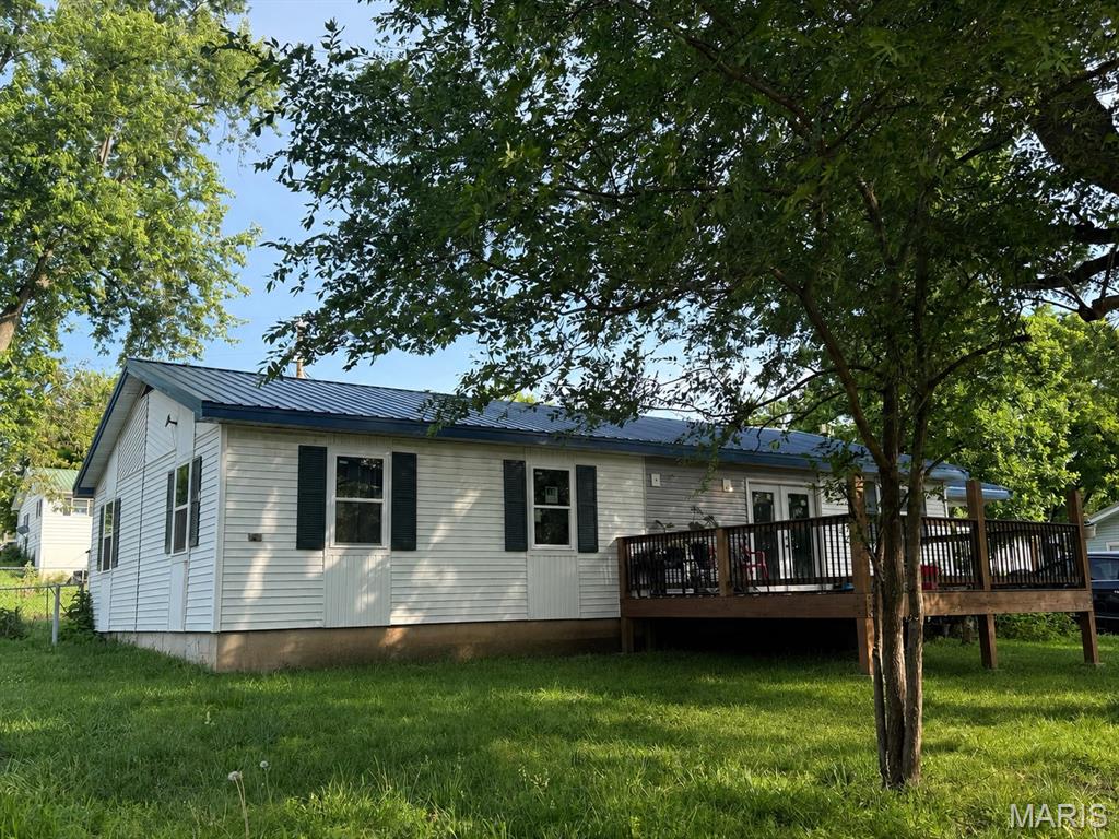 CHARMING IN-TOWN OPPORTUNITY! This 3 bedroom, 2 bath home offers plenty of potential and is conveniently located in the middle of town! With a newly remodeled kitchen, this home is ready for any get together! There is also a small shed and fenced in back yard. The fenced in back yard provides a nice space for pets, play or gardening!