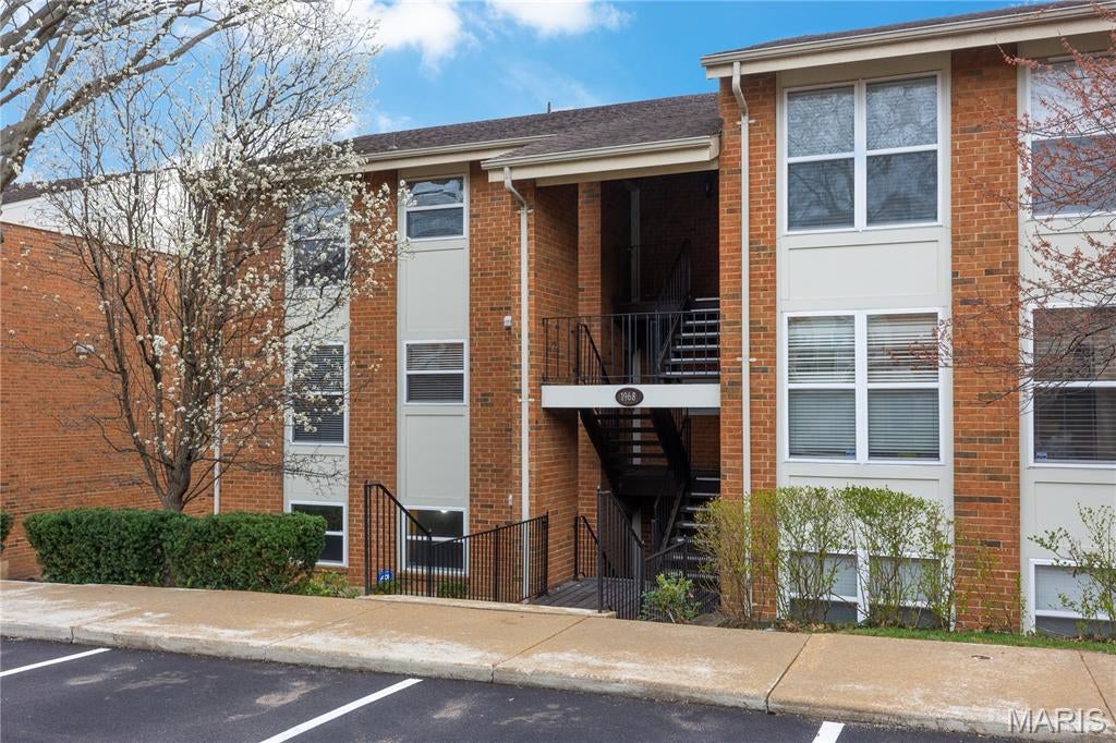 **Rare opportunity to own a highly sought-after ground-floor, 2-bedroom, 2-bath condo in Kirkwood!** Ground-floor units with a **private covered concrete patio** rarely become available, making this an exceptional opportunity. Even better, **two pets of any size are permitted**, a rare feature that truly sets this community apart.

Step inside this **move-in-ready** home and discover stylish updates throughout, including beautiful luxury vinyl plank flooring, fresh designer paint in today's sought-after neutral color palette, and updated bathrooms featuring newer vanities and toilets. The spacious, open-concept living and dining area is ideal for both everyday living and entertaining. The thoughtfully designed kitchen offers quartz countertops, a generous pantry, and **all-new stainless steel appliances installed in June 2026**, giving buyers the peace of mind and convenience of an updated kitchen. Convenient **in-unit washer and dryer hookups** add to the ease of everyday living. The spacious **primary suite** and second bedroom both feature large closets and comfortable, functional living spaces.

Greenbriar Condominiums offers outstanding amenities, including a sparkling **inground pool**, clubhouse, fitness center, scenic pond, walking trails, and beautifully landscaped grounds. **Unlike many units within the community, this condo enjoys a quieter setting with minimal highway noise**, while still offering convenient access to I-270 and I-44. Enjoy maintenance-free living in one of Kirkwood's most desirable communities, close to parks, shopping, dining, grocery stores, medical facilities, and everything the St. Louis area has to offer.

An additional private storage locker, conveniently located within the same building, provides valuable extra space for seasonal décor, bicycles, luggage, sporting equipment, and other belongings, helping keep your home organized and clutter-free.

If you are looking for a low-maintenance lifestyle, this beautifully updated condo offers the perfect combination of comfort, convenience, and location. **Ground-floor condos with two full bathrooms, a private covered patio, all-new June 2026 appliances, minimal highway noise, and no pet size restrictions are exceptionally hard to find—don't miss this rare opportunity to own one of Kirkwood's most desirable condos!**