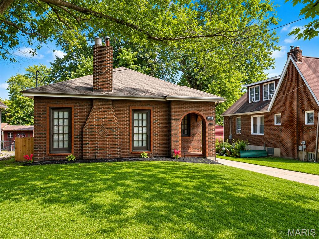 Beautifully renovated 1,270 sq ft brick home featuring 2 bedrooms, 1 bathroom, and a versatile extra room perfect for a home office, nursery, guest room, or hobby space. This move-in-ready home blends timeless character with modern updates, including refinished hardwood floors, a decorative fireplace, a fully remodeled kitchen and bathroom, a new roof, a completely updated electrical system with whole-house rewiring, and a new water heater. The detached garage, clean basement, and flexible floor plan offer valuable storage and living space rarely found at this price point.