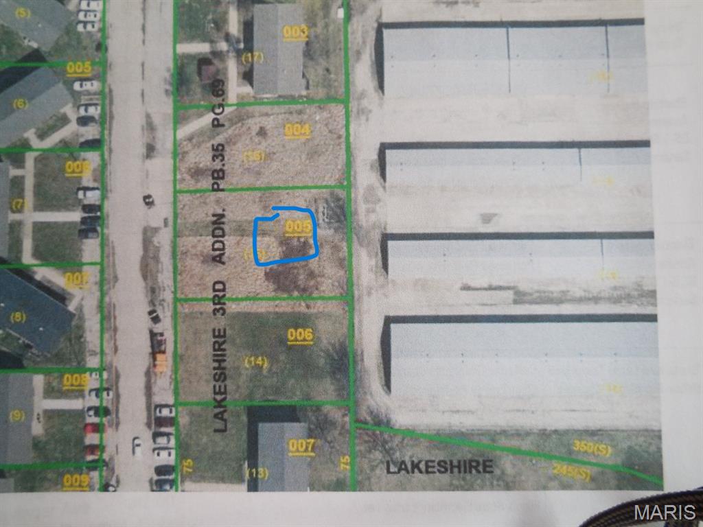 VACANT LOT READY FOR YOU TO BUILD A 4 PLEX,   SURROUNDED BY REHABBED 4 FAMILIES