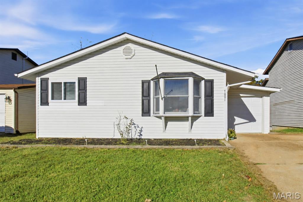 Welcome home to 7001 Wayles Dr! This is a great opportunity in the well-established Village of Jefferson subdivision of Barnhart!Inside finds a spacious floor plan that’s ready for your personal touches: a spacious family room; a large eat-in kitchen with a breakfast bar; the primary suite includes a walk-in closet and private bath with a patio door leading out to the expansive deck overlooking level backyard space that backs to common ground. On the main level you’ll also find two additional bedrooms and a full second bath. The walk-out lower level adds a generous rec room/family space, another finished room great for an office or game room, a half bath and a small kitchenette—presenting strong potential for extra living space, guest quarters or flexible usage. The exterior, you'll find the home at the end of a cul-de-sac, with a 1-car garage with built-in shelving/storage, and a patio + large deck out back, with privacy behind the home. This combination of price, financing eligibility, sizable living areas and lot/back-yard setting makes this a compelling choice for the right buyer!