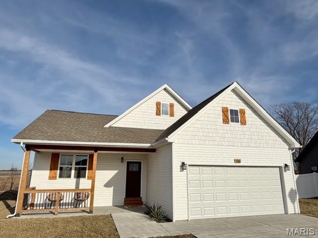 PRICE CHANGE... $284,000.  This like new construction features 3 Bedrooms, 2 Bathrooms, Main Floor Laundry, and a 2 car Garage. The lay out boasts an open floor plan with extraordinary lighting. Cathedral ceilings in Living room and Primary Suite, 9' ceilings throughout the rest of home makes home feel open and airy. Kitchen opens to spacious living room/dining room. Kitchen presents stainless steel appliances, Shaker style extended length cabinets for extra storage, floor to ceiling cabinet left of fridge, and lazy susan in corner. Primary suite features windows placed perfectly for additional lighting, but room to place furniture, walk in closet, private bath with dual sinks. Front foyer shares garage entry and coat closet, arched entry way to Living Room and Hallway. Tucked away laundry in the hallway, leaves extra room for a folding table. 20 x 17 back patio for entertaining and covered front porch. Easy access to Hwy 70 for commuting. New tree line across back of home.