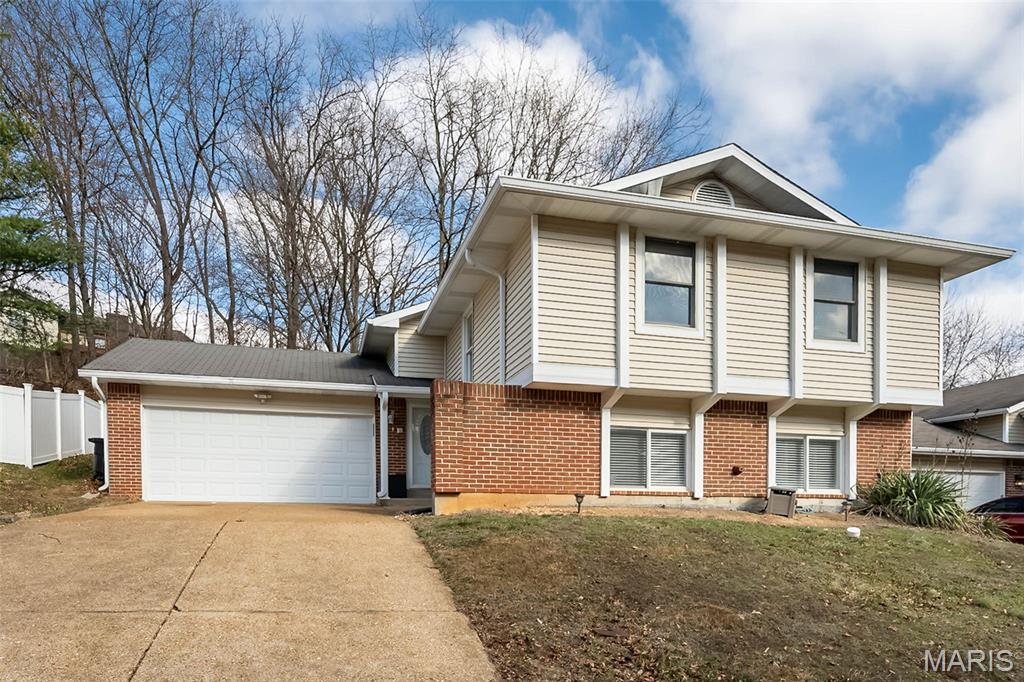 Welcome to The Re-Launch of 537 Treetop Village dr. in the Parkway School District. This split-level home just had a Full Complete new Professional Paint job and looks Fantastic. Vinyl siding and Tankless water heater installed withing the last 7 years. Plenty of space for a growing Family or a Family that just wants to spread out. New Carpeting installed 7-17-26, Painting just completed, new hardware, this home will not disappoint.