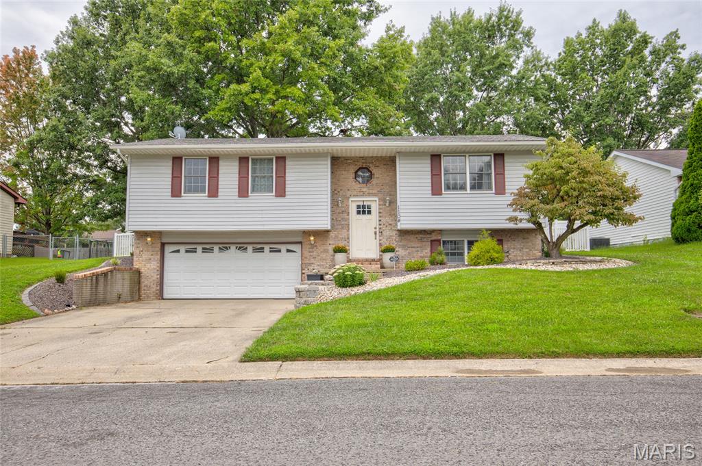 Get ready to picture yourself in this nicely updated home in a great Bethalto neighborhood. Recent upgrades include both bathrooms in 2025 as well as the addition of a water softener and a 3-stage whole house water filtration system, electric water heater in 2024, landscaping in 2023, fresh paint throughout and much more. The upper level offers a spacious primary bedroom with an ensuite full bath, 2 additional bedrooms and a combination kitchen/dining room that leads to a new backyard patio complete with a firepit for those upcoming chilly autumn evenings. Both bathrooms include bluetooth speakers wired into the fans. The lower-level family room has an electric fireplace with a custom wood surround and mantel. This room also includes an egress window, so it could be used as a 4th bedroom. With loads of natural light, 200-amp electric service, a 2-car attached garage and a backyard that's fully fenced with a vinyl privacy fence, this is a dream home that is calling your name! Call your favorite realtor to schedule a private showing soon.  Before making an offer on any property, buyer should independently verify all MLS data, which is derived from various sources and not warranted as accurate.