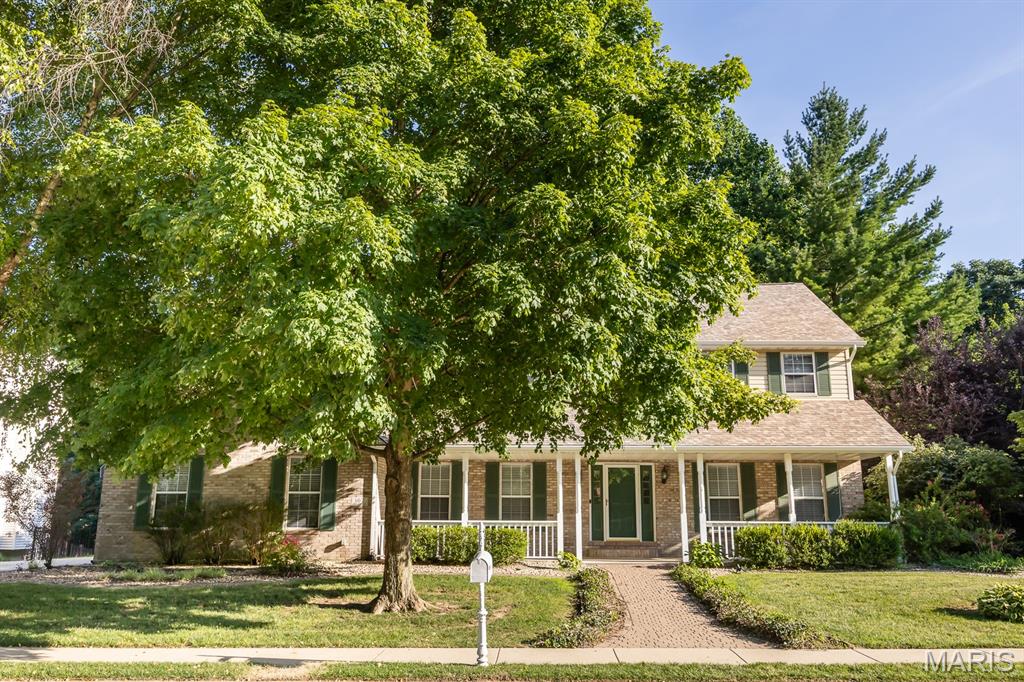 This custom-built home sits on a beautiful, wooded lot spanning over a half acre, offering privacy and plenty of natural surroundings. Step inside to an impressive two-story entry that sets a welcoming tone, with open and airy 9-foot ceilings and generous extended square footage throughout the thoughtfully designed layout.
The main level features a formal dining area alongside a large, open kitchen with a central island and high-end stainless steel appliances, creating an ideal space for both everyday living and entertaining. Adjacent is a bright sunroom that flows seamlessly to the private backyard, where mature trees provide ample shade and space for outdoor exploration and relaxation. The spacious great room showcases a cozy gas fireplace and connects through elegant glass French doors to the living room—perfect as a second media area or a light-filled home office.
Upstairs, the large bedrooms offer comfort and flexibility, highlighted by the primary suite with two walk-in closets. The finished walk-out lower level adds significant living space with ample storage, including a fifth bedroom with its own full bath for guests or extended family. Additional highlights include updated fixtures and appliances throughout, plus an oversized three-car garage. This home perfectly blends elegance, functionality, and outdoor connection in a serene setting.
