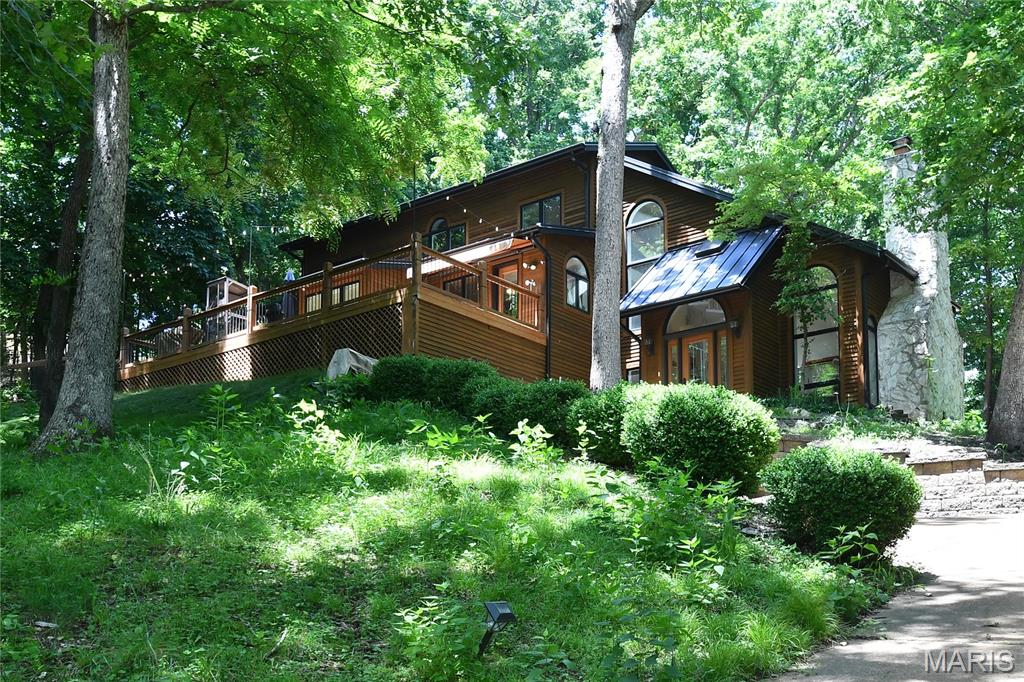 AVAILABLE AUGUST 1ST - Discover 903 Strecker Rd, a single-family residence with a Colorado-modern style situated on a 3 acre lot.  Privacy with a lodge type feel. This home, and property is like a retreat. Living room (or currently dining room) includes a wood burning fireplace --its blower heats most of the house. This is an all electric home! Main level includes a kitchen, dining rm, main floor laundry and a primary-suite complete with walk-in closets and a jetted tub. The large, wrap around deck is accessible from this level too. Level 3: 3 additional bedrooms, a full bath, and a large family room. The windows, & natural light, enhance the wooded beauty around this home. The look is rich, the space is unique, & the feel is breath taking. Fenced area for pets finished with turf. Prefer longer-term lease.  Tenants pay all utilities. Pets allowed with additional fees. Applicants must make atleast 3x the rent in monthly income. 680 credit or higher. NOW SHOWING