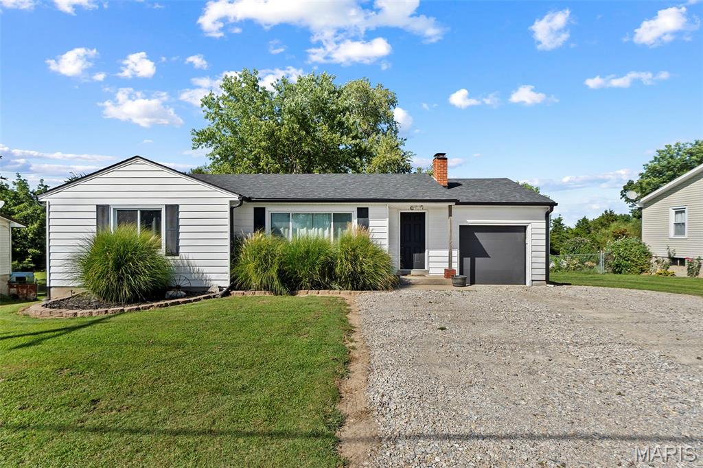 Welcome home to this charming ranch on the west side of Jackson in the Jackson School District! This 2-bedroom, 1-bath home offers original hardwood floors and a comfortable, functional layout with plenty of opportunity to make it your own. The kitchen appliances stay, making move-in that much easier. Downstairs, the partially finished basement adds valuable extra living space, including a bonus room perfect for a home office, playroom, workout space or additional hangout area. Outside, you’ll love the large backyard with plenty of room to entertain, play or simply enjoy the outdoors. With newer updates including the roof and windows, this home combines character, space and peace of mind in a convenient Jackson location!