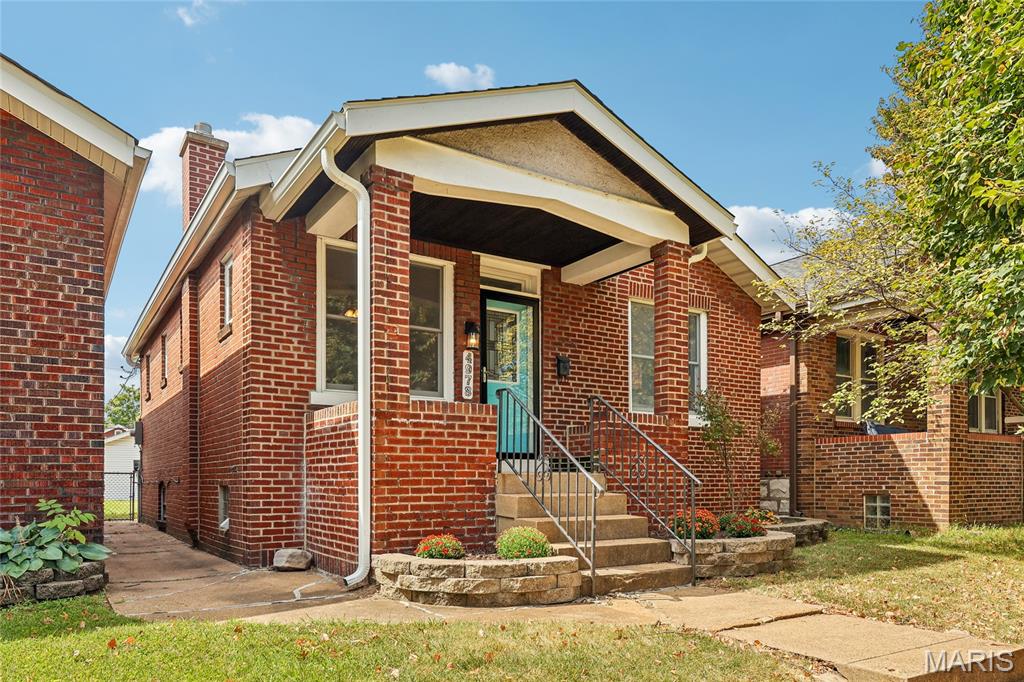 FRESHLY UPDATED PRINCETON HEIGHTS CHARMER! Welcome home to this move-in-ready South City bungalow, perfectly situated on a charming street in sought-after—and still affordable—Princeton Heights. Set on a large, level lot with a detached 1-car garage, this home delivers classic St. Louis character, fresh updates and exceptional additional living space.

A welcoming front porch sets the tone. Step inside to beautiful hardwood floors, stained glass, a classic fireplace and abundant natural light. Two cheerful bedrooms offer comfortable main-level living, while the kitchen features stainless steel appliances, a pantry, generous storage and room for a small island.

One of the home's sweetest surprises is the light-filled rear sunroom with a bay window—perfect as a dining area, home office, sitting room or plant-filled retreat.

The finished lower level takes this home well beyond the expected, offering exceptional additional living space with a second FULL bath, spacious living/entertaining area and flexible bonus space that could serve as an office, guest area or optional sleeping area.

Outside, enjoy a large, level fenced yard with plenty of room for pets, gardening and outdoor entertaining, plus a patio and detached 1-car garage.

And the location? You're minutes from South Hampton, St. Louis Hills and Holly Hills, with easy access to Willmore and Carondelet Parks, the YMCA, shopping, dining and neighborhood favorites including Hatch'd, Onesto's, Russell's, Pueblo Solis, La Catrina and Salt + Smoke.

Freshly updated. Full of character. Flexible living space. Large lot. Garage. And an affordable opportunity to call sought-after Princeton Heights home.  ADDITIONAL PHOTOS COMING 9/10/26