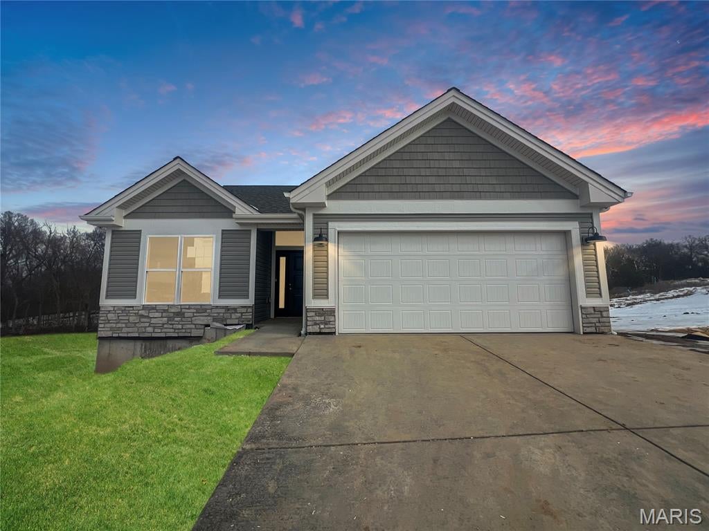 Why would you waste money on renting when you could own a new home built by Northern Star Homes? 
This new home is perfect for first-time buyers or those looking to downsize to an affordable new home. You can own a brand-new home with all the modern comforts you've been dreaming of and during October, take advantage of $5000 off this new home.

Step inside and be greeted by an open-concept living space flooded with natural light, perfect for entertaining friends. The sleek kitchen features an island with seating. This plan offers two bedroom and two baths on the main level. 
Here are the options included with the new home:   Two car garage, 9' ceilings throughout the main level, walk out lower level, 12x12 deck, 12x12 patio at lower level, island kitchen, Whirlpool appliances, upgraded faucets and lighting, oversized windows in the great room, an open staircase, and upgraded flooring.

This home is in a desirable neighborhood with easy access to Target, Kohl's Aldi and other restaurants.  The walking trail, dog park, and pickleball courts are nearby, and of course you're just a jog from beautiful downtown Washington.   

This new home is low maintenance home and sits on a gorgeous homesite providing level driveway and is designed for low maintenance and easy living. 
Washington is an excellent place to live, work and retire, and Stone Bridge is close to walking trails, parks and tennis / pickle ball courts.  From Stone Bridge, you can get to shopping easily without getting on the main highway, and it's location on the east side of town makes commuting easy.

Visit Stone Bridge, located just off Bieker Road.
Built by Northern Star Homes -- Washington's hometown builder.