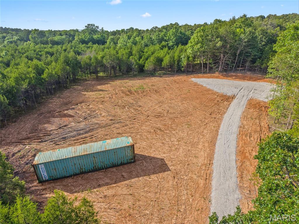 HOT PROPERTY ALERT! Don't miss this incredible 4.02-acre homesite in the prestigious Cedars at Bent Creek! Already partially cleared, this beautiful level lot is truly build-ready with a completed gravel driveway leading to a private homesite surrounded by mature trees. Enjoy the perfect blend of privacy, nature, and convenience with plenty of room for your custom dream home, outbuilding, pool, or outdoor living space! Opportunities like this are becoming harder to find. Bring your builder and start planning today!