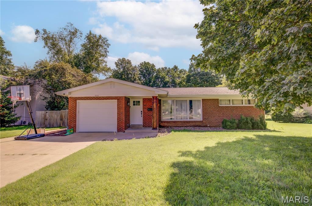 Welcome home to this charming 3-bedroom, 1.5-bath home nestled on a quiet cul-de-sac within the city limits. From the moment you step inside, you'll appreciate the warmth of the natural hardwood flooring and the thoughtful updates throughout. The spacious living room features updated luxury vinyl plank flooring (April 2025), while the kitchen offers refreshed cabinetry and a new garbage disposal. A smart thermostat adds modern convenience and energy efficiency.

Each bedroom is equipped with pocket doors, maximizing the available space while adding character and functionality throughout the home. Downstairs, the basement provides additional space for storage, hobbies, or future possibilities.

Step outside to enjoy the spacious, privacy-fenced backyard—perfect for entertaining, children, pets, or simply relaxing. Located on a quiet cul-de-sac with a park directly across the street, this home offers the perfect blend of peaceful living, convenience, and thoughtful design. Whether you're searching for your first home or your forever home, this move-in-ready gem is one you won't want to miss!