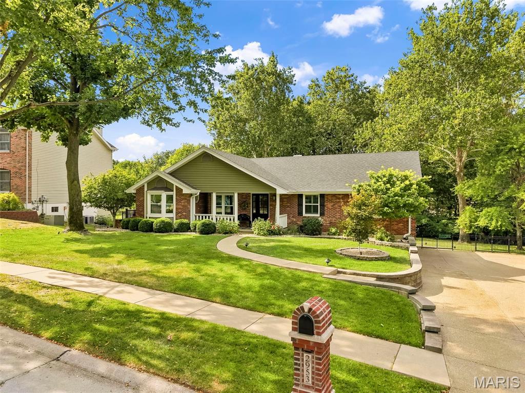 Nestled on .735 acres beneath a canopy of mature trees, this stunning all-brick ranch offers over 3,600+ square feet of beautifully renovated living space with 5 bedrooms, 3 full baths, an incredible walk-out lower level, and a pool!

From the moment you step inside, you’ll appreciate the soaring vaulted ceilings, inviting wood-burning fireplace, natural sunlight, and thoughtful finishes throughout. Enjoy the beautifully updated kitchen with custom 42-inch cabinetry, double ovens, and seamless access to the outdoor entertaining spaces. The spacious primary suite offers new carpeting 2026, and features a luxurious bath with a walk-in shower with bench seating, adult height vanities, and separate soaking tub. 3 additional bedrooms plus a laundry room on the main level, provide plenty of space. 

The finished walkout lower level offers a recreation/family room, a full bath, and a versatile bunk room highlighted by a wall of custom closets. Step directly into the second sunroom and out to the huge backyard and pool-creating an incredible indoor-outdoor setting for entertaining! Even the side entry garage has been thoughtfully upgraded with epoxy floors, new garage doors, and custom built-in lockers/closet storage!

The backyard is nothing short of AMAZING! A massive 30x15 saltwater inground heated pool, a pavilion, an expansive patio, wraparound walkways, and lush park-like setting create the perfect backdrop for summer gatherings or peaceful evenings at home.

What truly sets this property apart is the investment the current owners have upgraded in nearly every major component including: Roof 2023; Fence 2018; Deck off Kitchen 2018; Reformatted the Pool 2023; replaced and expanded the Backyard Patio 2020;  Windows-Entry Doors-Siding in 2019; HVAC 2022; Tankless Water Heater 2024; renovated 2 Bathrooms 2021; additional Electrical Box 2019; Professional Landscaping; added Windows and Siding in Lower Level Sunroom 2021; and so much more. It’s rare to find a home where the beauty is matched by the quality of the improvements behind the walls.