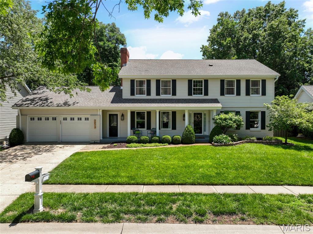 Welcome to 2073 Meadowbrook Way Drive, a beautifully updated 5-bedroom, 2.5-bathroom two-story home in the highly desirable Meadowbrook Farm neighborhood. Offering the perfect combination of timeless style, functional living space, and a prime Chesterfield location, this is a home designed to grow with you through every stage of life.

Step inside to discover hardwood flooring throughout the main level and a floor plan that balances open gathering spaces with comfortable everyday living. The spacious family room is anchored by a cozy gas fireplace, creating the perfect setting for everything from holiday celebrations to relaxing evenings at home. Natural light pours through the home, enhancing the warm and welcoming atmosphere throughout.

The kitchen serves as the heart of the home, offering ample workspace, storage, and views of the backyard. Whether you're preparing weeknight meals, hosting friends, or helping with homework at the kitchen table, this space was designed to bring people together. Formal and casual living spaces provide flexibility for entertaining, working from home, or simply enjoying time with family.

Upstairs, the spacious primary suite offers a private retreat complete with a large walk-in closet and an updated bathroom featuring double vanities, a separate shower, and soaking tub. Three additional generously sized bedrooms and an updated full bathroom provide plenty of room for family members, guests, or dedicated office space.

The finished walk-out lower level expands the home's living space even further, offering endless possibilities for a recreation room, media space, playroom, home gym, or work-from-home setup. With additional storage space and direct access to the backyard, it's a versatile extension of the home that adapts to your needs.

Outside, you'll find one of the home's most impressive features, a spacious deck overlooking the backyard, perfect for summer barbecues, morning coffee, or gathering with friends and family. The large lot provides plenty of room to play, entertain, and enjoy the outdoors. An oversized two-car garage adds convenience and additional storage for everyday living.

Located in the heart of Chesterfield, Meadowbrook Farm is known for its welcoming neighborhood feel, and convenient access to top-rated schools, parks, shopping, dining, and major commuter routes. This is more than just a beautiful house, it's a place to create traditions, make memories, and truly feel at home.