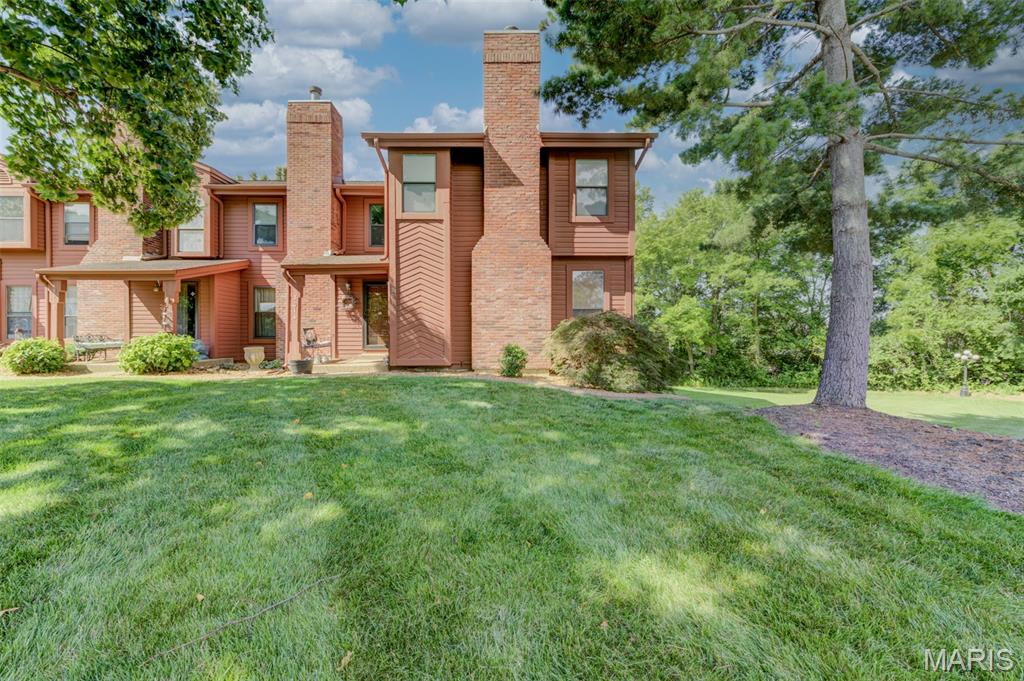Open House Saturday 6/27, 1-3 PM Welcome home to a beautifully maintained 1,777-sq ft townhouse offering comfort, style & serene natural surroundings. Fresh paint, warm neutral decor, rich stain package, updated lighting, custom blinds, new plush main-floor carpet & streams of natural light create an inviting atmosphere. Impressive open floor plan highlighted by stately staircase beneath a skylight & handsome woodburning fireplace anchors the living room. Dining room features charming bay window, elegant chandelier & convenient cut-out to the kitchen. Breakfast room & kitchen showcase striking wood flooring, wood cabinetry, stainless steel appliances w/updated disposal & enchanting garden window. Welcoming deck offers private retreat w/breathtaking views of mature trees and peaceful green space. Vaulted luxury primary suite offers walk-in closet & private balcony overlooking lush wooded backdrop, double sinks, whirlpool tub, separate shower, skylight & stunning stained-glass window. Two extra bedrooms, 2nd full bath & versatile second-floor laundry room complete the upper level. Well-lit basement provides excellent storage potential plus attached 2-car drywalled garage w/insulated door. Refrigerator & washer are included for added convenience. Recent updates offer tremendous peace of mind w/97%  Lennox HVAC (2022), water heater (2024), plumbing/toilets, Ring camera, smart thermostat & brand-new architectural roof in June 2026. Enjoy attractive landscaping, expansive green space, & quiet serenity surrounded by nature, just minutes from major roads, shopping, dining, and everyday conveniences. Residents also enjoy exceptional Community amenities: heated indoor pool, outdoor pool, fitness center, pickleball court, sauna & clubhouse. This outstanding property combines thoughtful updates, generous living space & resort-style amenities in a truly picturesque setting.