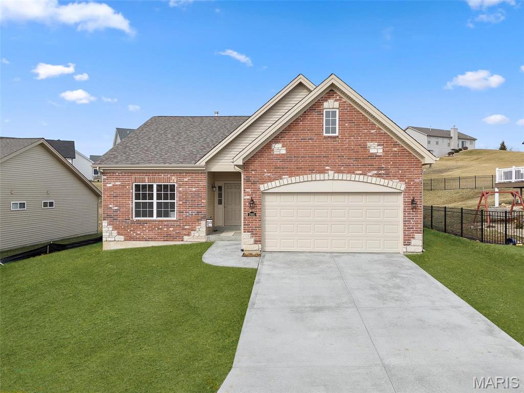 Be the first owner of this impressive, low maintenance, free standing villa by Bridgewater Communities in the beautiful Villas at Weber Farms neighborhood in Washington!  This quiet, established neighborhood offers small town charm with modern conveniences located nearby.  Offering low maintenance luxury designed and built for today’s buyers and their most desirable features and finishes.  The curb appeal is excellent with a brick front elevation, stone accents, architectural shingles, garage coach lights, lawn irrigation, professional landscaping, and full yard sod.  Features include 2 bedrooms, 2 bathrooms, 1,600 sq feet of open living space, an oversized 2 car garage, luxury vinyl plank flooring in the main living areas, 9 foot ceilings throughout, a Deluxe Kitchen, 42 inch cabinets with crown molding, custom cabinet features including soft close, quartz countertops,  island with seating bar,  pendant lights, recessed lighting, under cabinet lighting, stainless steel appliances, chimney style range hood, electric range, microwave, dishwasher, designer tile backsplash,  gas fireplace, custom trim, main floor laundry (accessible from the hallway or Primary Bedroom), luxury Primary Bath with split raised height vanities, comfort height commodes, marble shower with seat in the Primary Bath, luxury vinyl tile in the bathrooms, walk in closet, 32 inch interior doorways, Low E windows, upgraded carpet and pad in carpeted areas, 12x12 composite deck, egress window in the basement, rough in bath, garage door opener and more.  A low monthly fee pays for lawn care, lawn irrigation system including water, snow removal of over 2 inches (per indentures) and some insurance.  This amazing villa has easy access to Highways 47 and 100. Quality construction by the villa experts at Bridgewater Communities, beautiful neighborhood and fantastic features! This home is under construction and scheduled for a Summer 2026 completion.