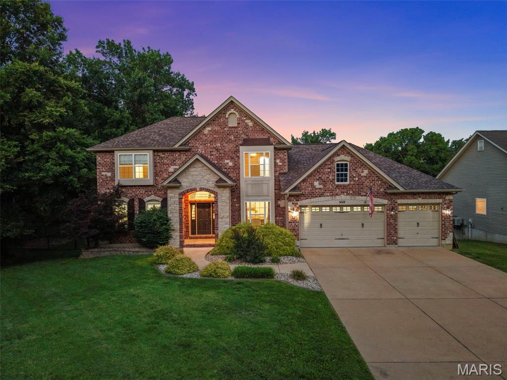 ***Open House Cancelled***

Some homes check boxes. 5628 Kerth Rd creates an experience.?

This stunning 5 bedroom, 3.5 bathroom home offers nearly 5,000 sq ft of beautifully designed living space on an almost 3/4 acre level lot, blending everyday comfort with resort style amenities and one of a kind character. Step inside to a dramatic two story foyer and an impressive living room filled with natural light from expansive windows. The true centerpiece? A custom indoor rock wall that brings unforgettable personality and wow factor to the heart of the home.

The main level features a spacious primary suite designed to feel like a true retreat, complete with a luxurious en-suite bathroom offering a double vanity, separate soaking tub and shower, and two walk-in closets. It’s the kind of private space that gives you room to slow down, unwind, and start or end the day comfortably. Do you love to cook? The kitchen is built to impress with custom cabinetry, tile backsplash, granite countertops, and a massive island with a custom wood top that becomes the natural gathering spot. Rounding out the rest of the main level also includes a convenient half bath, laundry/mud room, wet bar, and a layout made for both daily living and entertaining.

Upstairs, three bedrooms provide excellent additional space, including two bedrooms connected by a Jack-and-Jill bathroom. Downstairs, the finished walk-out basement expands the possibilities with generous living space, a second wet bar, and a private en-suite bedroom with full bath that’s ideal for guests, extended stays, or multi-generational living.

The backyard is where this property truly separates itself. Enjoy a saltwater pool with waterfall, pergola, deck overlooking the yard, basketball court, sauna, play set, fire pit, and storage shed all on a spacious, level lot with room to relax, play, gather, and entertain.

With a 3-car garage, flexible living spaces, standout amenities, and details you won’t find anywhere else, this is the kind of home that feels different the second you walk through the door.

5628 Kerth Rd is more than a place to live, it’s a place to make memories.