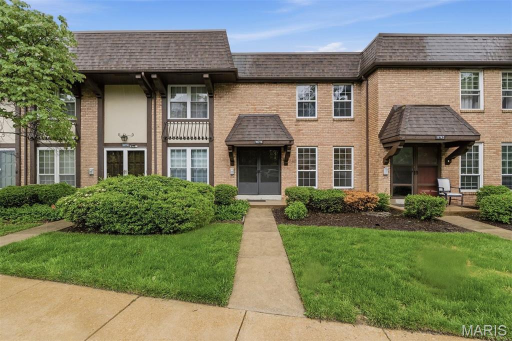 Buyer financing fell through. This beautifully updated townhome blends comfort, style, and everyday functionality. Recent enhancements include new flooring, kitchen appliances, modern light fixtures, and fresh paint throughout, creating a move-in-ready experience.

The light-filled living room offers a warm and inviting space, seamlessly connecting to a spacious eat-in kitchen complete with stainless steel appliances, a center island with breakfast bar, walk-in pantry, and a built-in desk niche—perfect for work or organization. A charming balcony extends the living space outdoors.

Upstairs, the primary suite provides a peaceful retreat with a walk-in closet, built-in desk, and a private bath featuring a walk-in shower. The generously sized secondary bedroom—thoughtfully reconfigured from two bedrooms—offers exceptional scale and versatility, complemented by a full hall bath with tub/shower combination.

The freshly painted lower level offers abundant storage with potential for future finishing, while a two-car garage adds everyday convenience.

Community Clubhouse, Pool, Tennis & Playground! 

Ideally located just minutes from Westport Plaza, shopping, dining, and cafes—this is effortless living in a prime location.