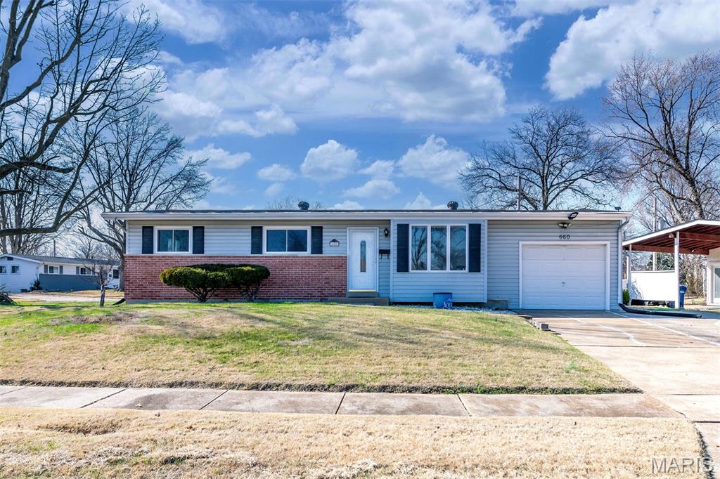 Welcome to 3 bedroom and 2 bathrooms, well-maintenance, corner lot, freshly paint thru-out, ready to move-in, one car garage with extra parking space on the side home.  Bay window in the living room makes for a bright a cheerful home.  Large eat-in kitchen with oak cabinets, flat top electric range. The master bedroom has hardwood flooring and very spacious. Bedroom two and three have a nice size with hardwood flooring too.  All hardwood floors were just refinished.  New roof in 2025.  The finished lower level is magnificent with extra space to use as an office or game room.  Lots of living space in the basement and a full bath along with nice laundry room.  The one car garage has a service door to the back yard with a patio and privacy fence surrounding the yard.