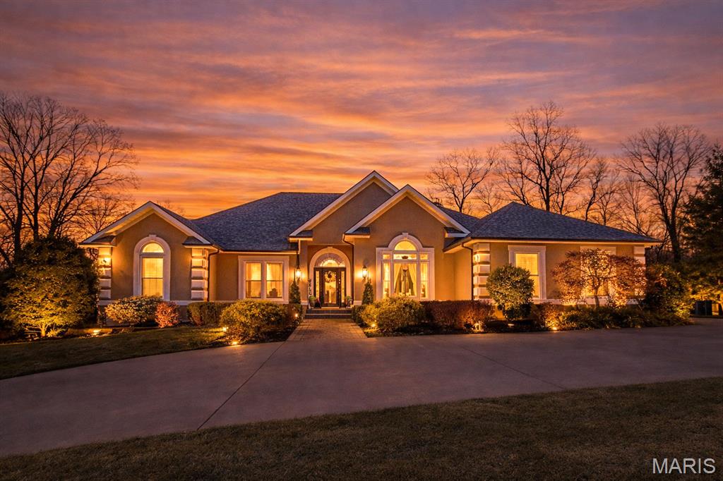 Welcome to 444 Windwood Lake Drive, an exceptional executive home in the prestigious Windwood Lake Estates. Set on a beautifully landscaped 1.48 acre lot, this custom 5,500+ sq. ft. residence blends timeless craftsmanship with luxurious, functional living.
The main level offers an open concept layout with soaring ceilings, grand lighting, and expansive windows overlooking the private backyard oasis. Three spacious bedroom suites, including a stunning primary suite with dual walk in closets, provide ideal main level living. The oversized kitchen, dedicated office, and two gas fireplaces enhance both comfort and convenience.
The walkout basement is perfect for entertaining with a full wet bar, large second living area, 4th bedroom, game room, and flexible space for a gym or hobby room.
Step outside to your resort like retreat featuring a secluded saltwater pool with automatic cover, covered hot tub, and fully irrigated, professionally landscaped yard wired for an Invisible Fence system.
Meticulously maintained with major updates including a new roof (2024), new gutters and leaf protection (2024), new garage doors (2025), newer HVAC units (2021 & 2024), updated windows (2022), and three new water heaters (2024–2025).
With lake access and close proximity to shopping, dining, and healthcare, this turnkey, luxury property offers unmatched comfort, privacy, and lifestyle.
Move-in ready and truly one-of-a-kind.