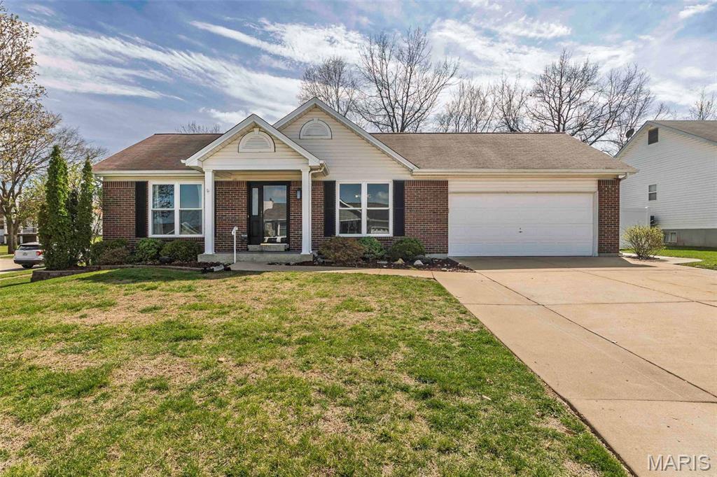 Step into comfort and style in this beautifully updated three bedroom, three bath ranch offering over 2500 square feet of finished living space. Situated on a large level corner lot, this home welcomes you with attractive curb appeal, mature landscaping, and a two car garage. Inside, you will find a bright open layout enhanced by updated flooring and brand new carpet, creating a clean and modern feel throughout. The vaulted great room features a warm gas fireplace and flows seamlessly into the dining area, making it ideal for both everyday living and entertaining. The kitchen is thoughtfully designed with custom cabinetry, granite countertops, tile backsplash, center island, pantry, and a dedicated workspace. The adjoining breakfast room opens to a screened in porch and patio, providing the perfect setting to enjoy the backyard and outdoor gatherings. The spacious primary suite offers a walk-in closet and a private bath complete with double sinks, a soaking tub, and separate shower. Two additional bedrooms, a full bath, and main floor laundry add convenience and functionality. The finished lower level expands your living space with a large family room, recreation area, flexible room that could serve as a home office or sleeping area, and a full bath. Additional features include a whole home water filtration system for added comfort and peace of mind. Located in a sought after area with easy access to highways, top rated Wentzville schools, shopping, and dining. Move in ready with thoughtful updates throughout, this home is ready for its next owner. Open House Sunday 03/29 from 1:00 PM to 3:00 PM. Floor plans located in the photos.