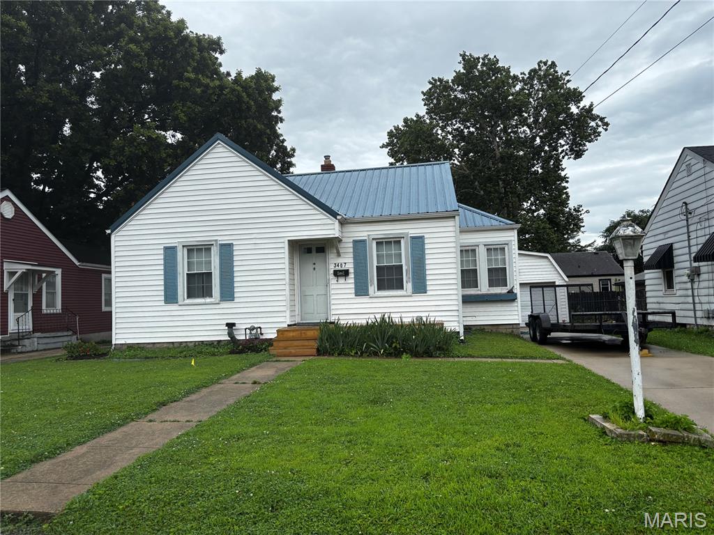 Investor Special or Handyman Opportunity!  Bring your vision to this spacious 2-bedroom, 2-bath home with a partially finished basement and endless potential.  This solid home has great bones and is ready for someone to add their personal touch with a little TLC.  Major updates have already been completed, including a metal roof that's only 5 years old, gutters with gutter guards installed 5 years ago, and a furnace, hot water heater, and paved driveway that are approximately 10 years old.  Whether you're an investor looking for your next project or a buyer wanting to build instant equity, this property offers an excellent opportunity.  With its strong structural foundation and big ticket improvements already in place, all that's needed is your creativity to make this home shine again.
Buyer is responsible for verifing all information.