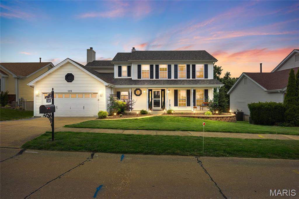 Welcome home to this beautifully updated 4-bedroom, 2.5-bath residence located in the highly sought-after Summer Chase community! From the moment you step inside, you'll be captivated by the bright, open-concept floor plan designed for both comfortable everyday living and effortless entertaining.

The heart of the home is the spacious kitchen, featuring abundant cabinetry, ample prep space, appliances included, and seamless flow into two inviting living areas. To one side, the dining room has been transformed into an incredible entertaining space featuring a custom bar complete with extensive cabinetry, butcher block countertops, beverage refrigeration, abundant storage, and a stunning stone accent wall with floating shelves that creates the perfect focal point for gatherings. On the opposite side of the kitchen, you'll find a spacious hearth room with cozy gas logs, a convenient main-floor laundry room, and access to the oversized, fully drywalled extra-deep two-car garage.

The entire rear of the home is lined with large bay windows that showcase picturesque views and flood the interior with natural sunlight, creating a warm and inviting atmosphere throughout. Whether hosting game day celebrations, holiday gatherings, or quiet evenings at home, this thoughtfully designed main level offers the perfect setting.

Upstairs, retreat to the luxurious primary suite featuring a beautifully renovated spa-inspired bath complete with a freestanding black soaking tub, oversized custom shower with multiple shower heads, double-basin vanity, and a spacious walk-in closet. Three additional generously sized bedrooms and a newly renovated hall bathroom complete the upper level.

Step outside and enjoy your own private backyard retreat. The newer composite deck is complemented by a gazebo and natural gas BBQ grill, making outdoor entertaining a breeze. The white vinyl fenced yard backs to common ground, providing beautiful views and added privacy. Relax on the deck and enjoy stunning sunsets in this peaceful setting.

The unfinished walk-out lower level offers endless possibilities for future expansion and includes two large windows, a rough-in bath, and direct access to a large aggregate patio—ready for your vision to create additional living space.

Additional updates include a new roof and gutters installed in 2021.

Residents of Summer Chase enjoy access to a community pool and sports court, while families will appreciate the ability to walk to Kellison Elementary, Rockwood South Middle School, and Rockwood Summit High School.

This exceptional home truly offers the perfect combination of location, updates, entertaining space, and lifestyle. Schedule your private showing today and make this beautiful home yours!