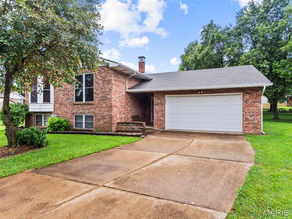 Welcome to 1612 Berry Ct in Imperial, Missouri! Located in the desirable Windsor School District and tucked away on a quiet cul-de-sac, this home offers the perfect combination of space, comfort, and convenience. 3 bedrooms, 2.5 Bath, very clean home, fully electric central air and heat pump. This home is Situated on nearly half an acre, the property features a very large backyard with plenty of room to play, entertain, garden, or simply enjoy the outdoors. Beautiful Brick home with steel siding providing exterior comfort. The oversized 4+ car garage provides incredible space for vehicles, toys, hobbies, storage, or a workshop.

A roof less than a year old adds peace of mind for the new homeowner. Located in a great neighborhood with easy access to shopping, restaurants, and everyday conveniences, this is a wonderful opportunity for families looking for space both inside and out. Come see all that 1612 Berry Ct has to offer!