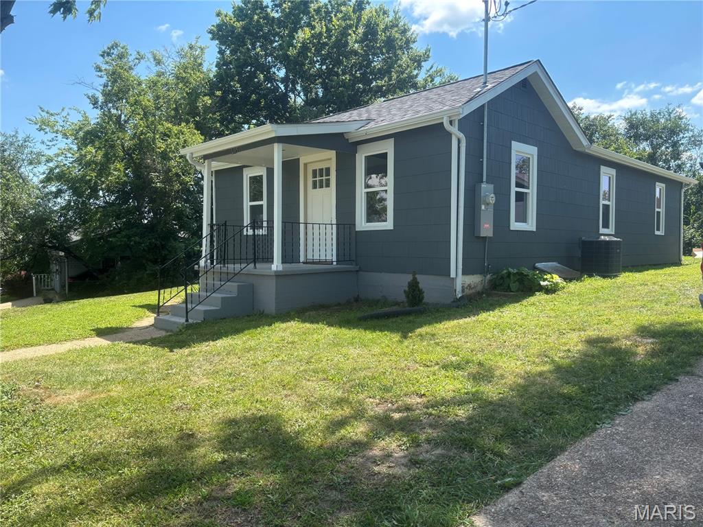 This adorable turn-key 2 bedroom is a must see! Enjoy the new kitchen, bathroom, windows, roof, finished hard wood floors and much more. The house has a great yard with a detached garage too. Open floor plan with main floor laundry. Don't miss your opportunity to view this beautifully rehabbed house.
