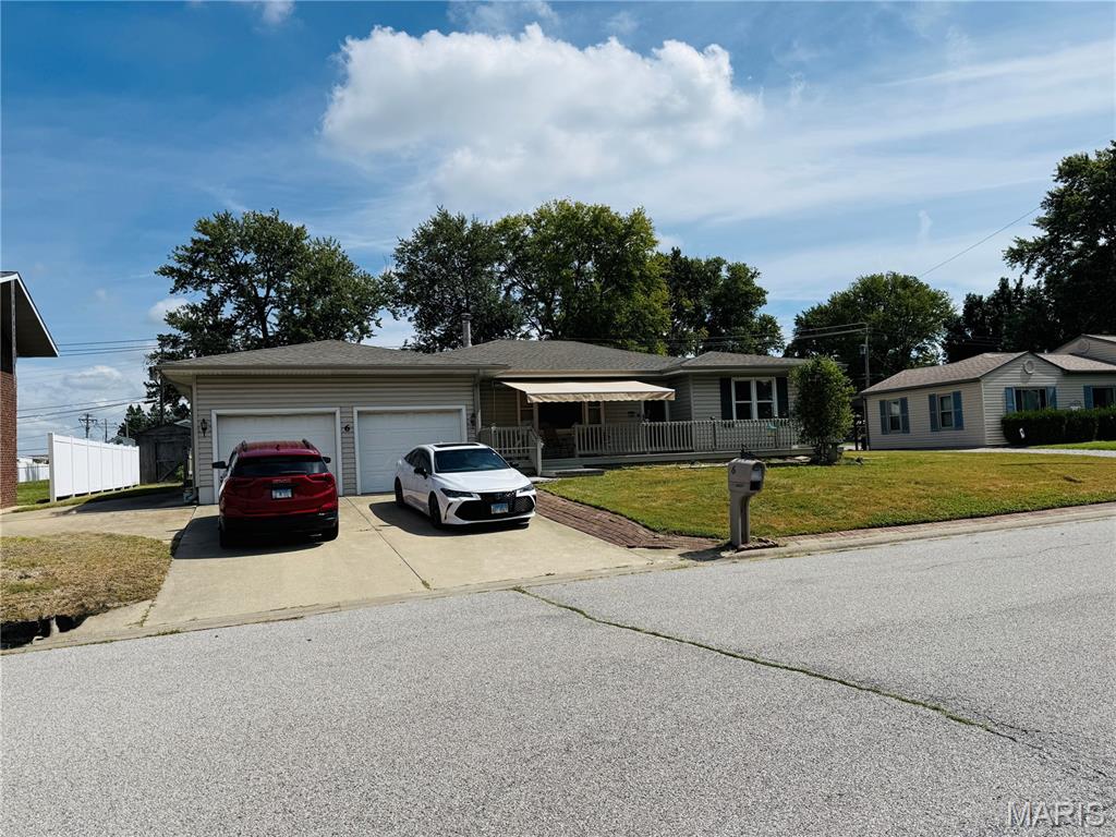 This inviting ranch-style home offers comfortable living with 3 bedrooms, 1 full bath, and a 2-car garage. The third bedroom has been converted into a convenient laundry room but could easily be converted back to a bedroom, offering flexibility to fit your needs. Recent updates include the HVAC system, water heater, bathroom, and front porch, providing peace of mind and added appeal. The full unfinished basement offers abundant storage and potential for additional living or recreational space, with portions already partitioned into separate areas. Outside, the large, level backyard provides plenty of room for entertaining, gardening, play, or relaxing. With its functional layout, valuable updates, full basement, 2-car garage, and spacious yard, this home is a great opportunity for buyers looking for an affordable home with room to make it their own! The seller will make no repairs and will not provide occupancy permit. Home will be sold in its current condition. Showings available starting 9/16/26. Sqft and information deemed accurate but not guaranteed. Buyer or Buyer's Agent to verify all information.